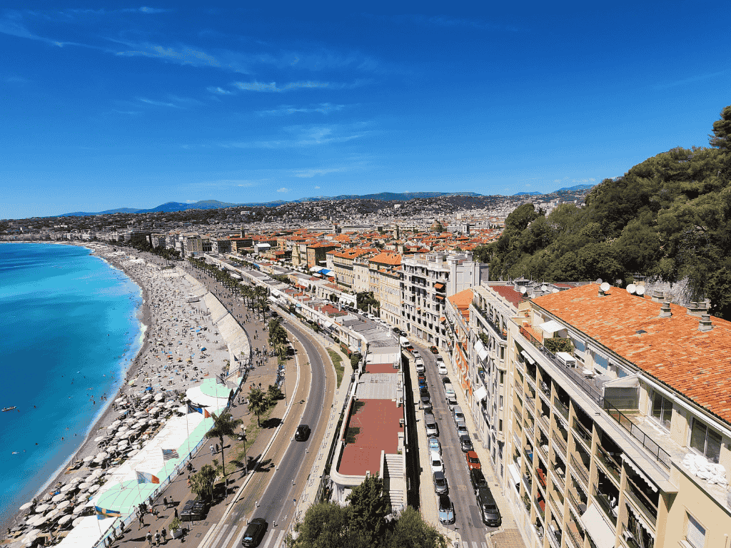 View of Promenade des Anglais and seafront apartment buildings in Nice on the French Riviera